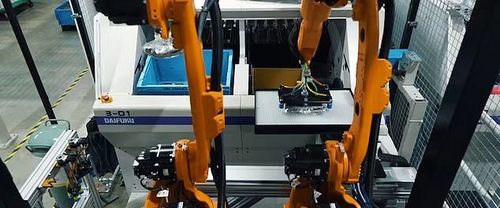 日本优衣库采用mujin机器人打包服装工厂接近完全自动化